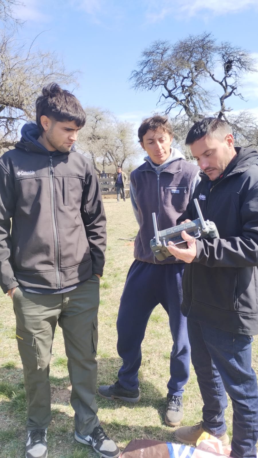 Team checking drone